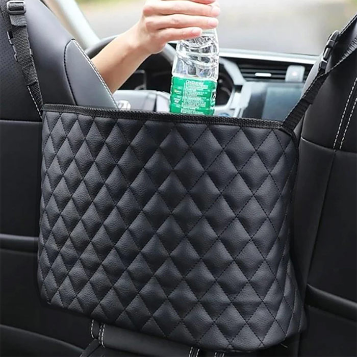 Facile da inserire tra il sedile del guidatore e quello del passeggero!
